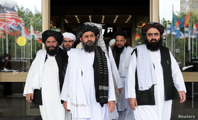 FILE PHOTO: File picture of members of a Taliban delegation leaving after peace talks with Afghan senior politicians in Moscow